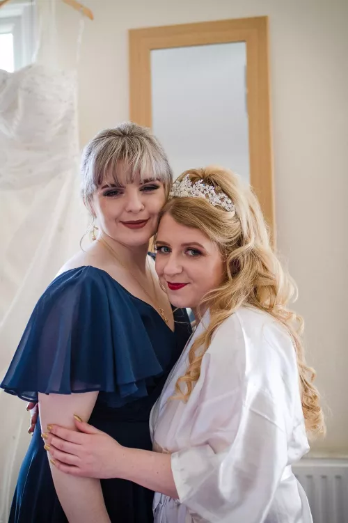 5 ups to see how Thick Michelle (left) is. Lovely pic at her sister's wedding for reference by Liontamer2019