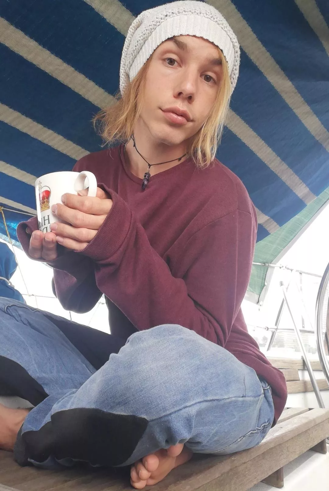 a cute, faerie, blonde, bottom gayboy wearing a comfy jumper... I probably beat your asses online in games though, no mercy posted by Local-Dish7067