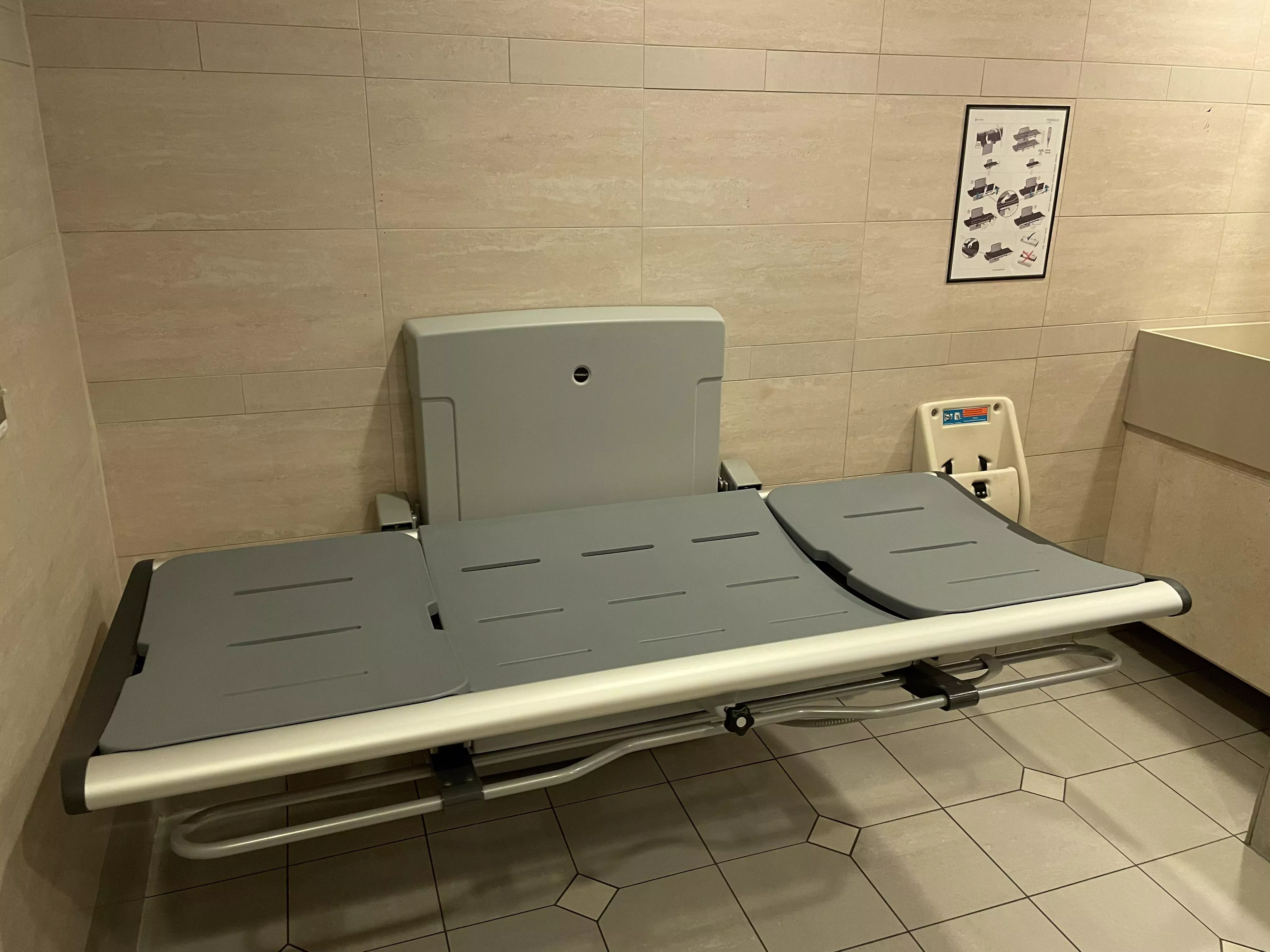 Adult changing station. Came across this at the Milwaukee airport. I’d love to use this someday. posted by Diaperdiver987