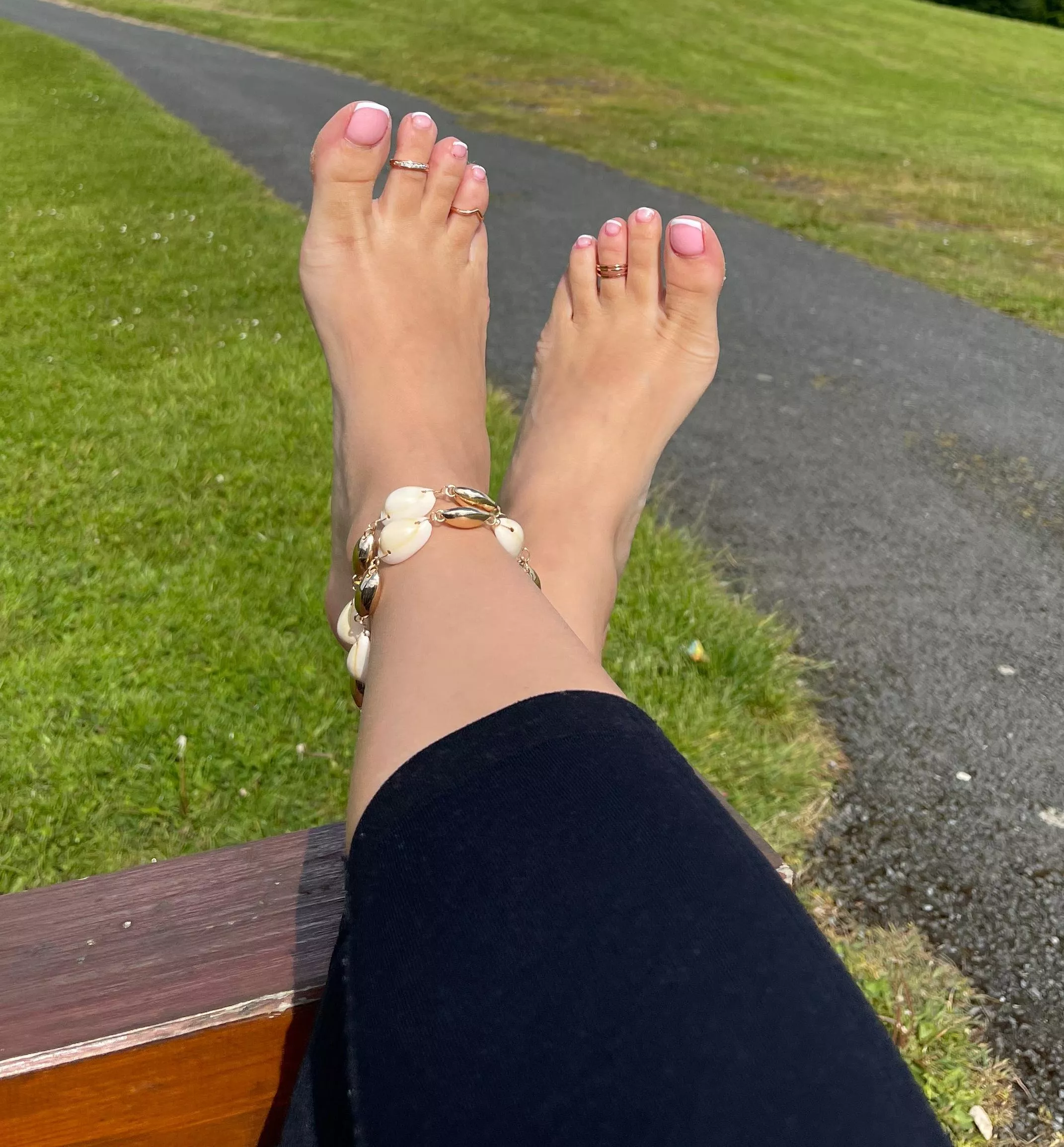 After morning walk, love to stretch my feet on the bench 🤭 What would you do if I ask you to take a photo? posted by MistressCathie