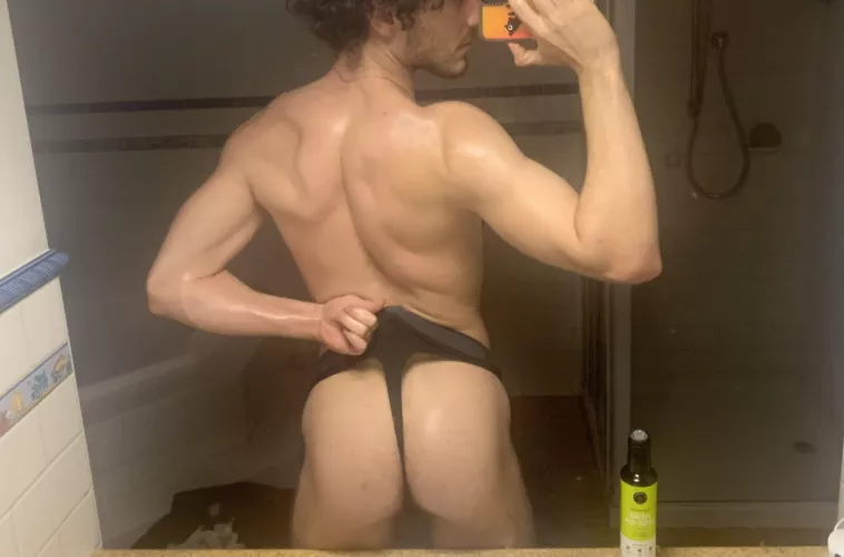 All oiled up, who wants to wrestle? 🤼‍♂️ by Traditional-Ad2386