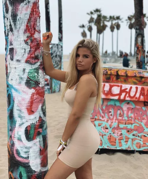 Beautiful women posing in front of graffiti by ResponsiveCock