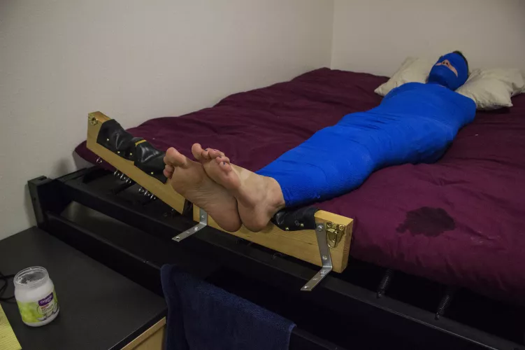 Behind the scenes of a short break before being locked facedown for more tickling! OC by cashewfeet1