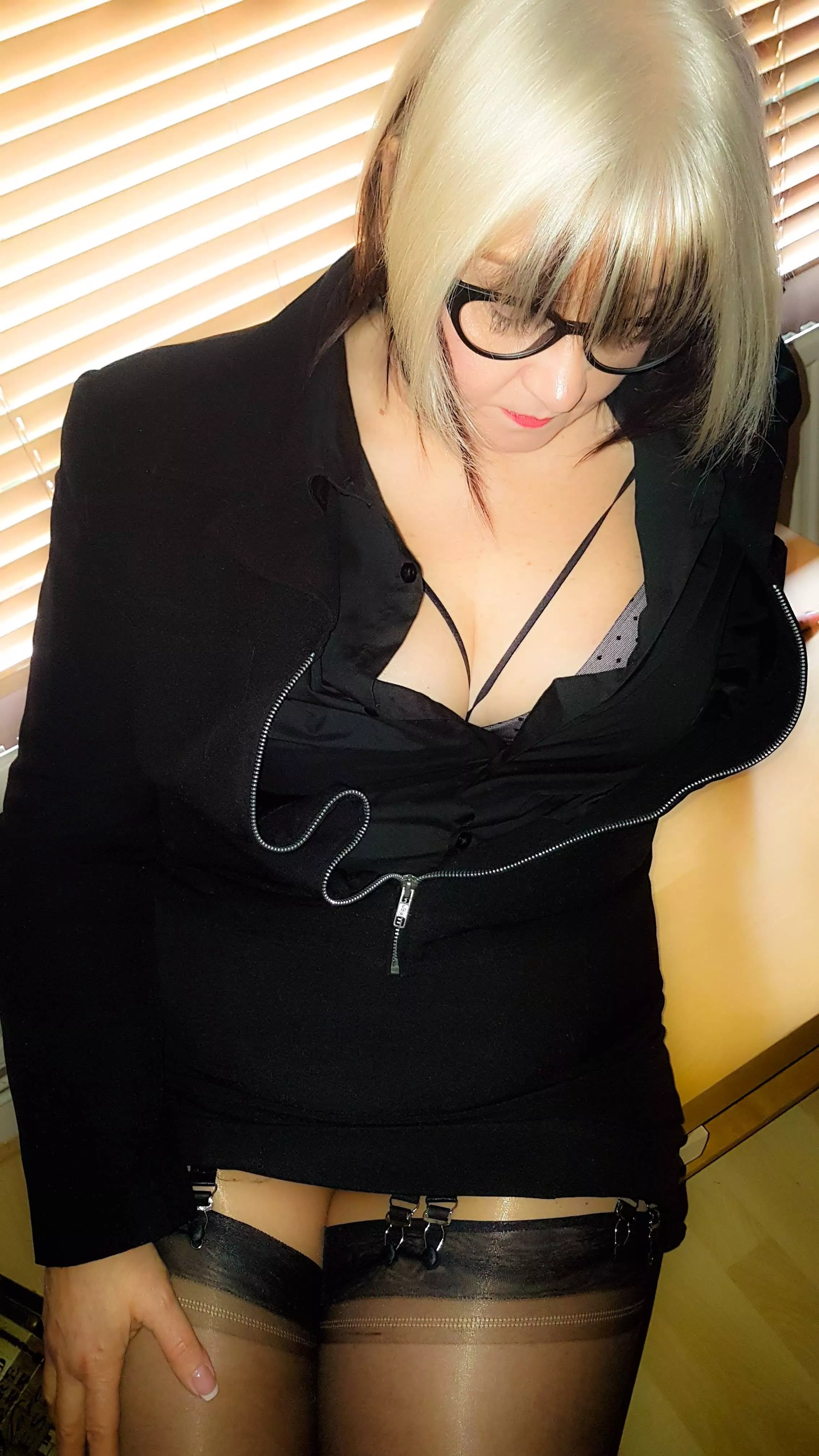 Blonde in black posted by nylonteese