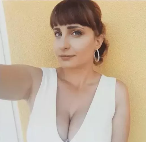 Busty brunette milf cleavage by Due_Reputation_3525