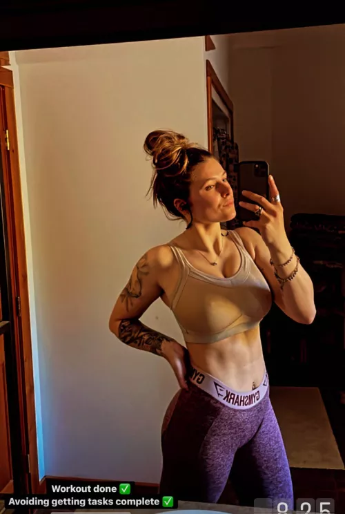 Busty in a sports bra by Theyounggetstronger