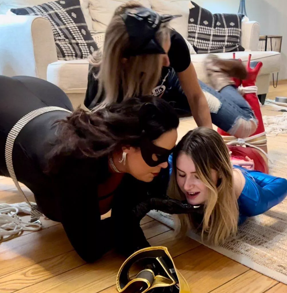 Caption this still from Ultragirl Turnabout is Fair Play starring Christina Carter, London Evans, Lora Cross and Kody Evans. Own it now at tiedtales. com posted by tiedtales