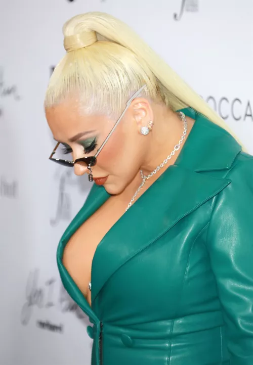 Christina Aguilera is checking her cleavage by Freddys007