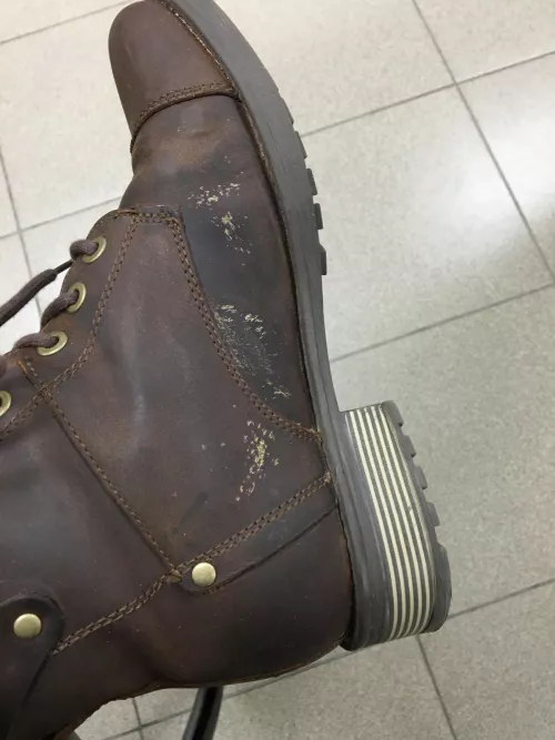 Dear community, my boots made with greased leather have this and I’ve already greased them yesterday, with this being already present before. Any ideas what is and how to fix it? by Wojak_Argento