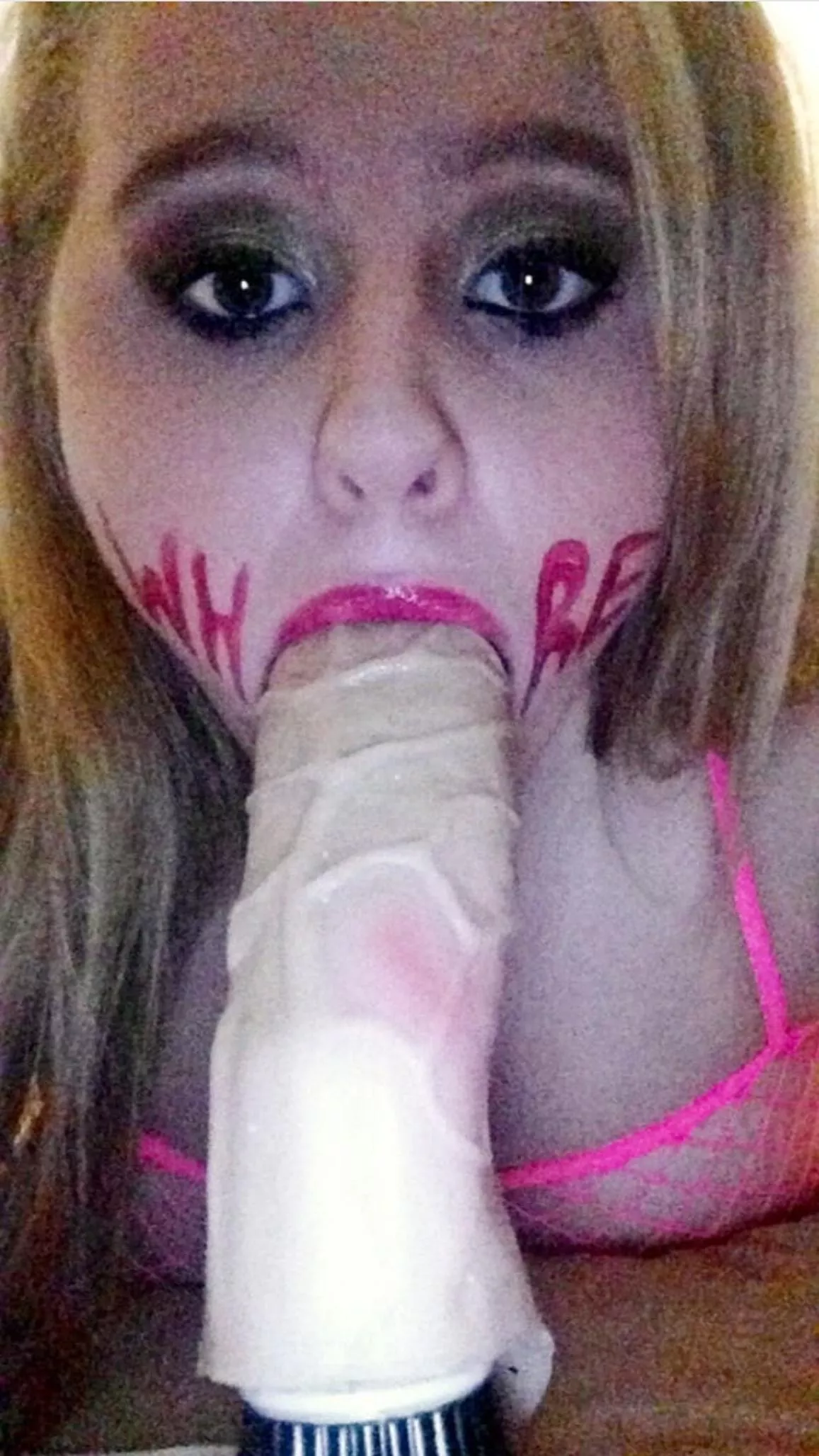 deeply conditioned to be a cock toy and the lipstick is a trigger look how empty her eyes are posted by Psychological-Lie-32