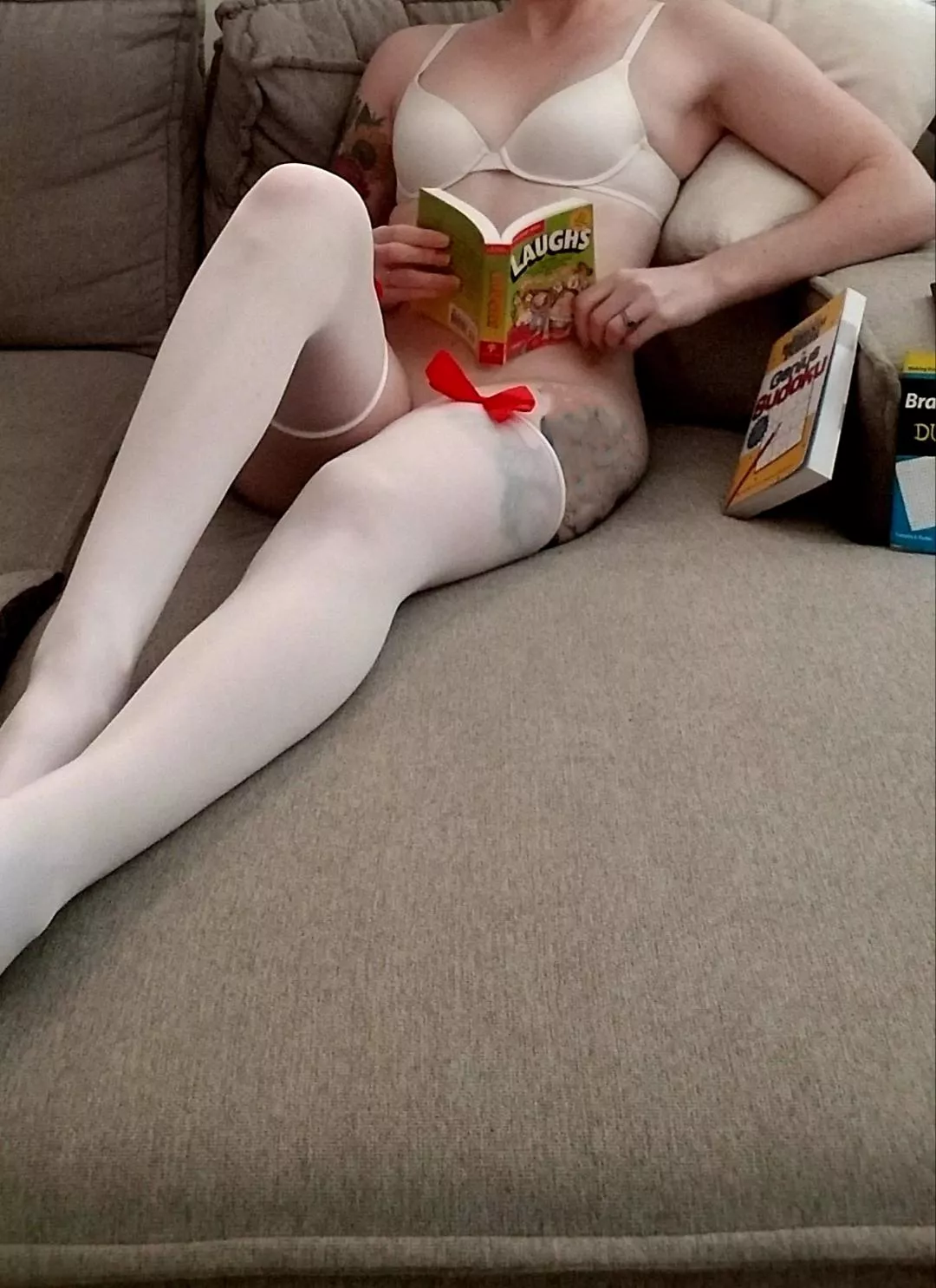 Do you like long, pale, tattooed legs? posted by Fajitafeet_xo