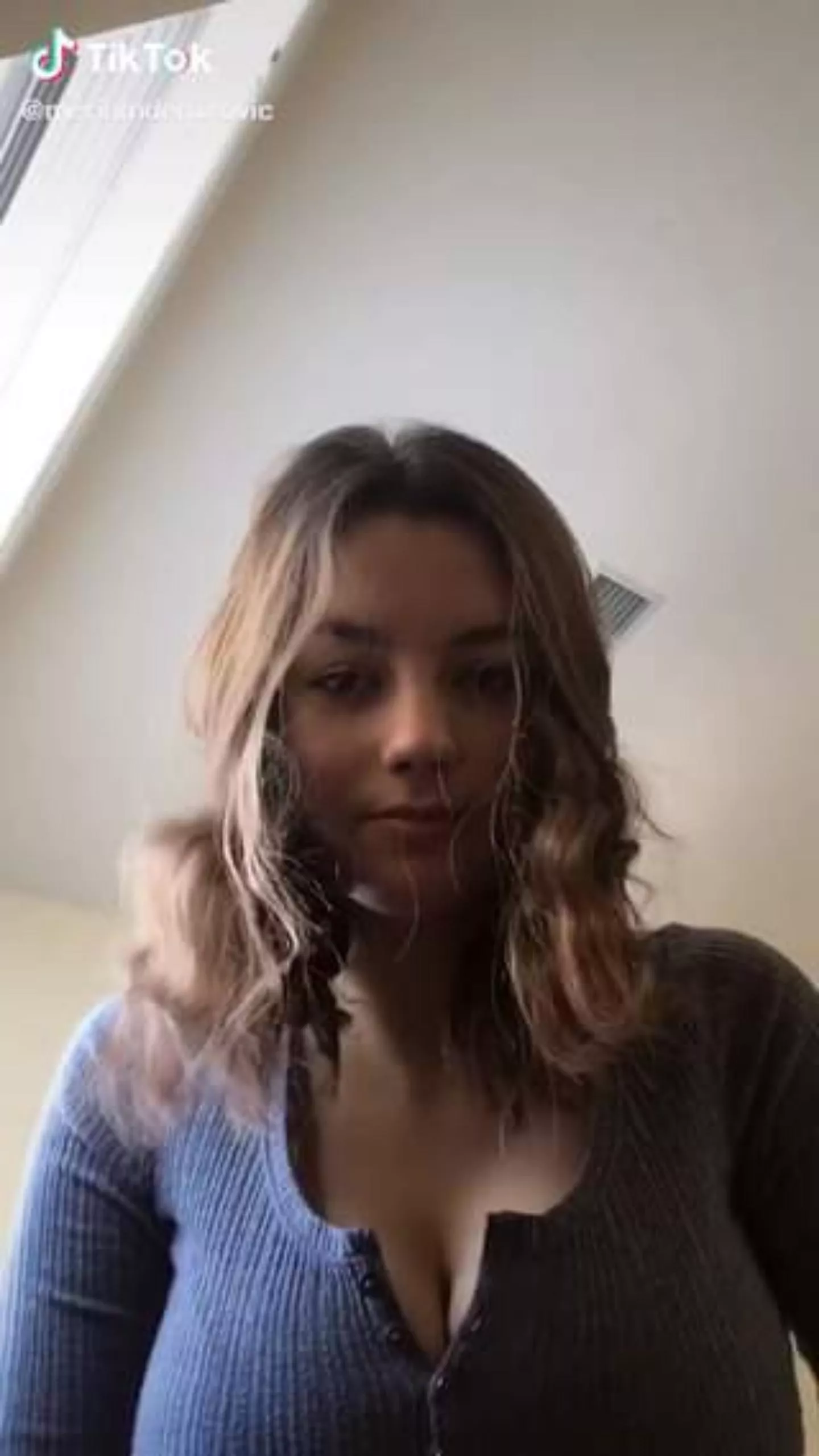 Does anybody know this TikTok girl? she busty posted by CrackBlazer