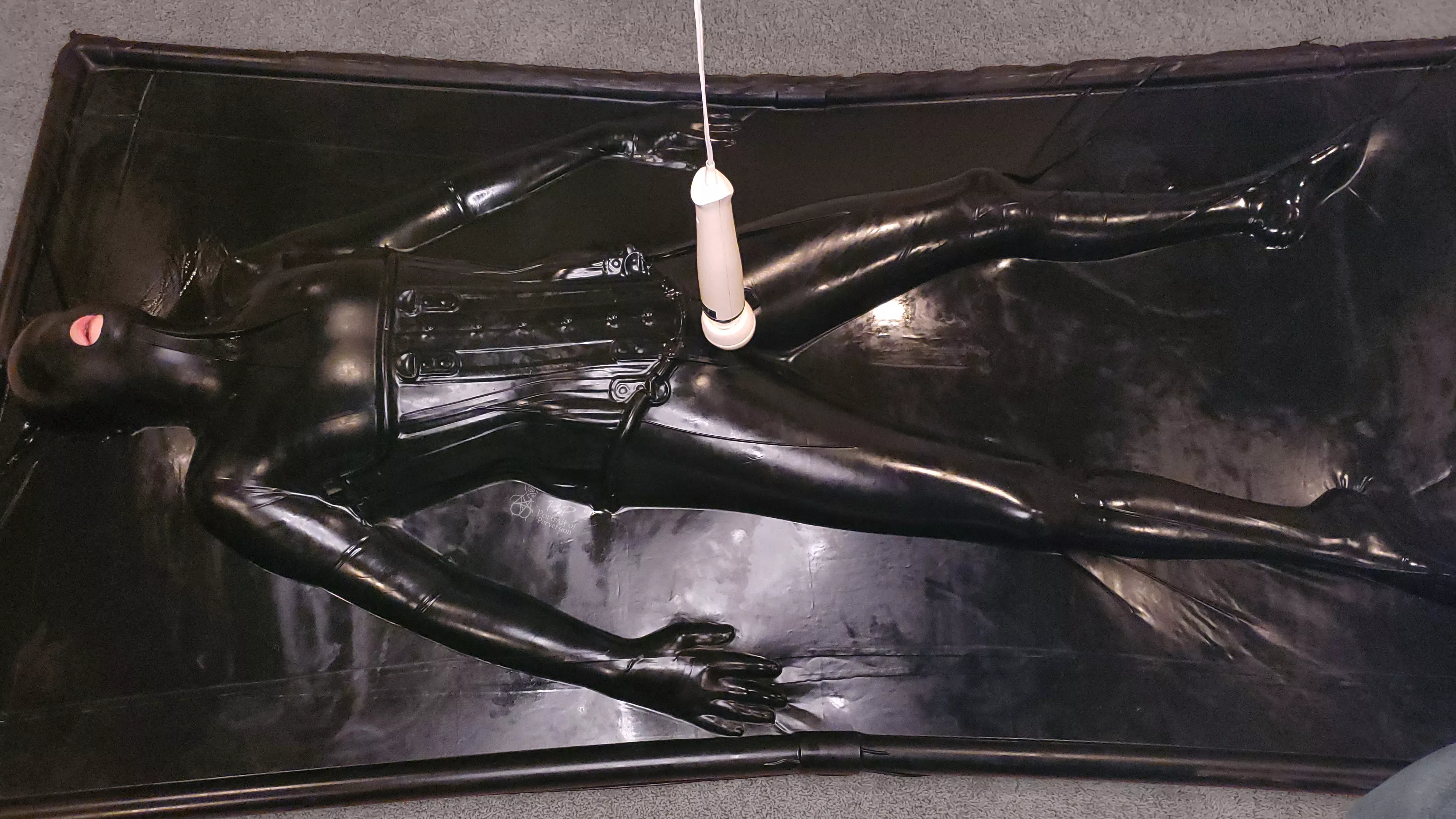 [f] Trapped in a Latex vacbed & being teased with a wand posted by PortraitOfPerversion