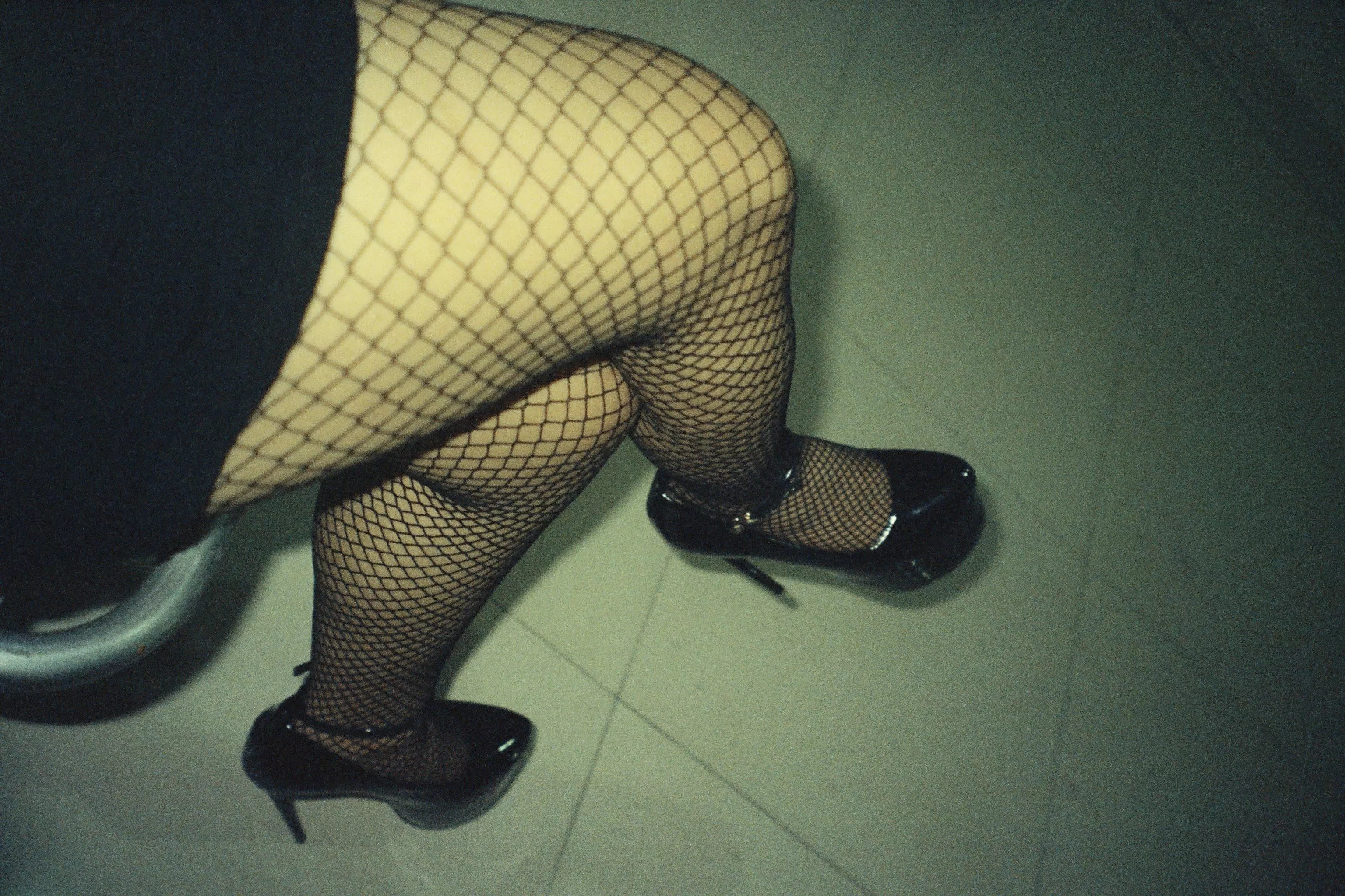 fishnets and heels posted by maddyjuana