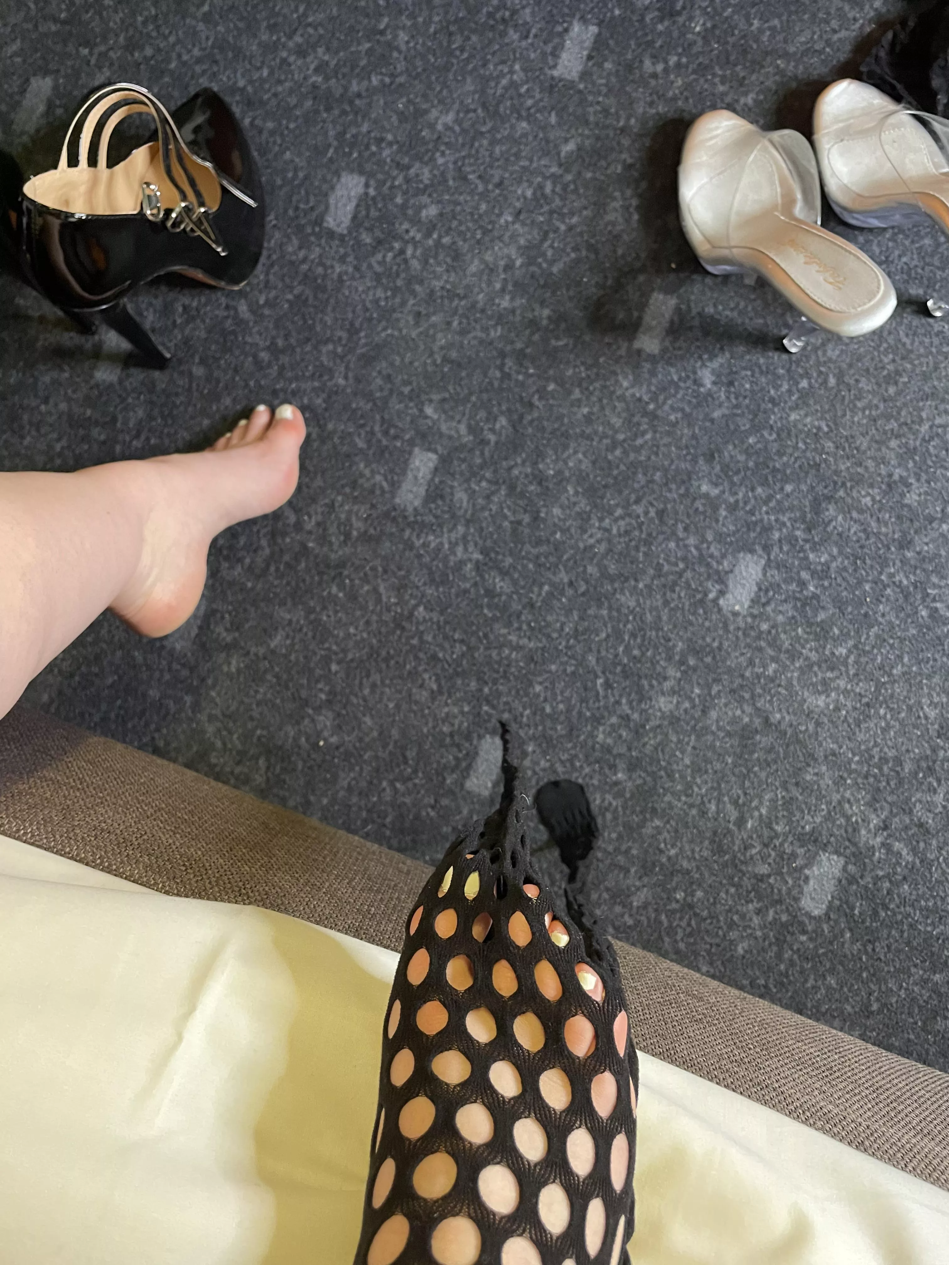 Getting out of my outfit after taking some pics 😊 posted by heeled_valentine