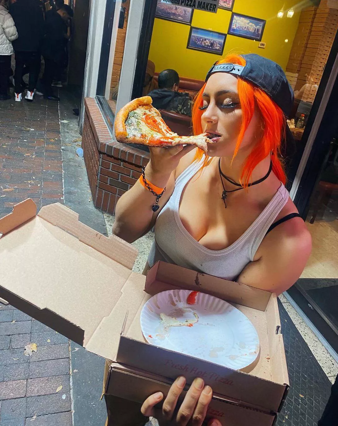 Gigi Dolin with pizza. posted by bingho45