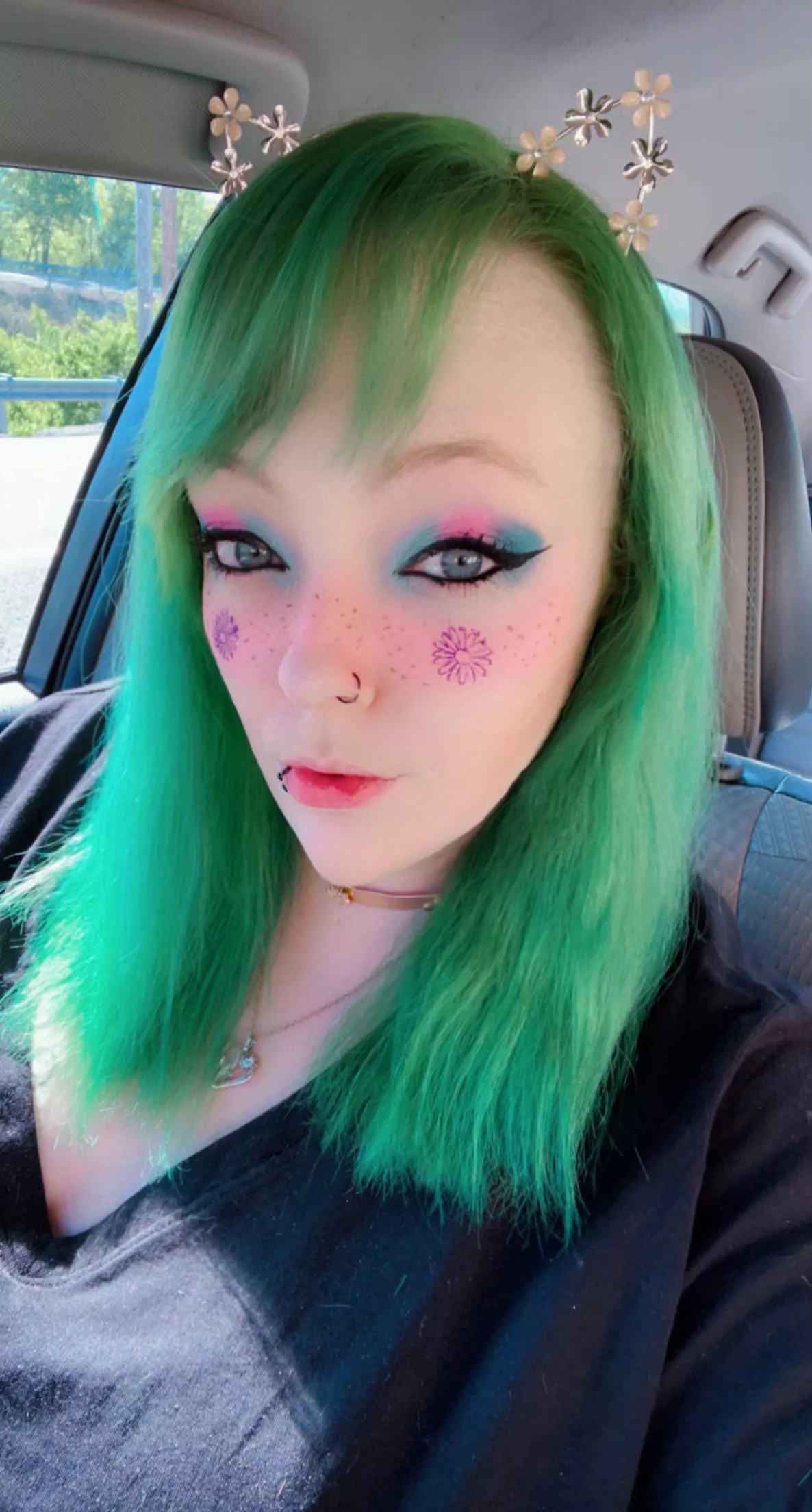 Got a cute kitty ear headband with flowers posted by RainbowNerdVana