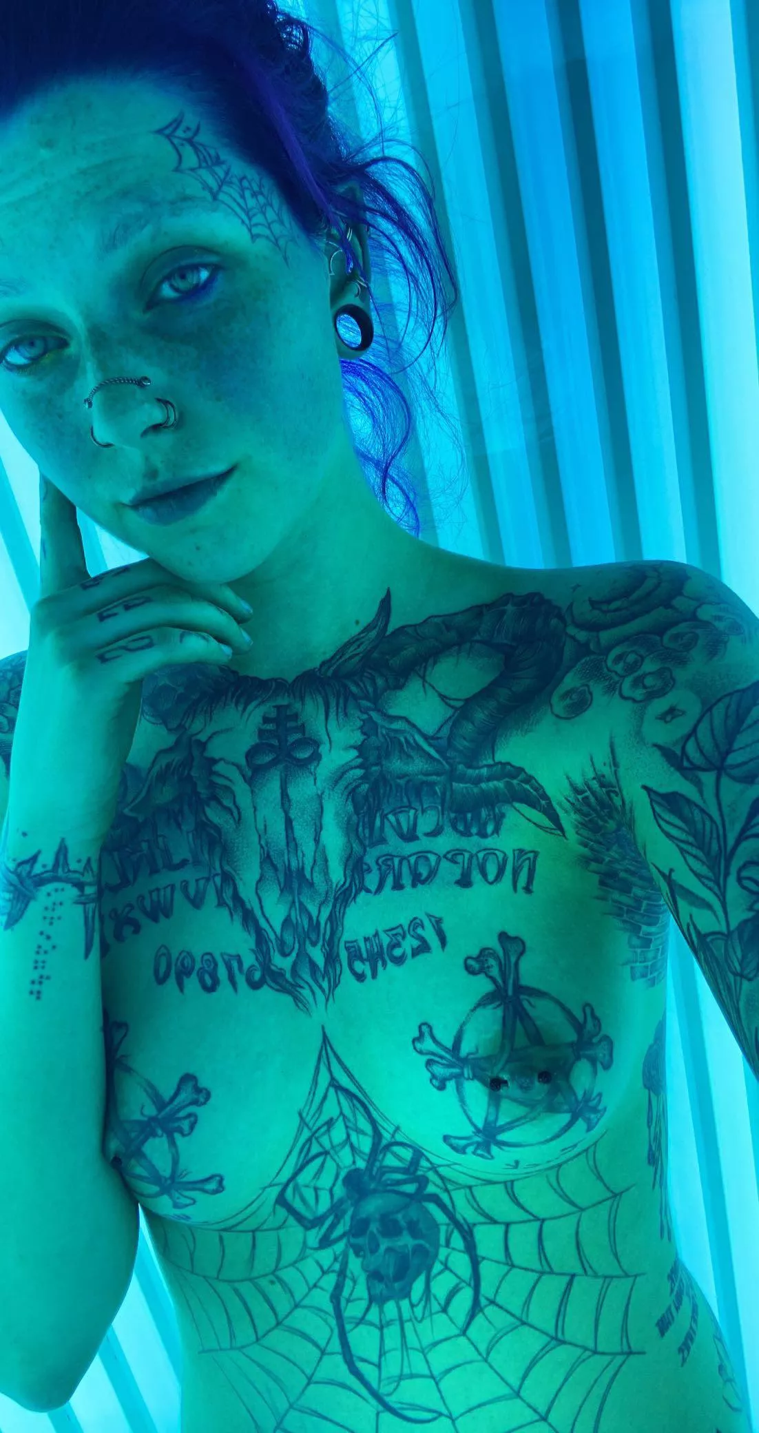 Hair looks extra neon under a tanning light posted by spider_legs666