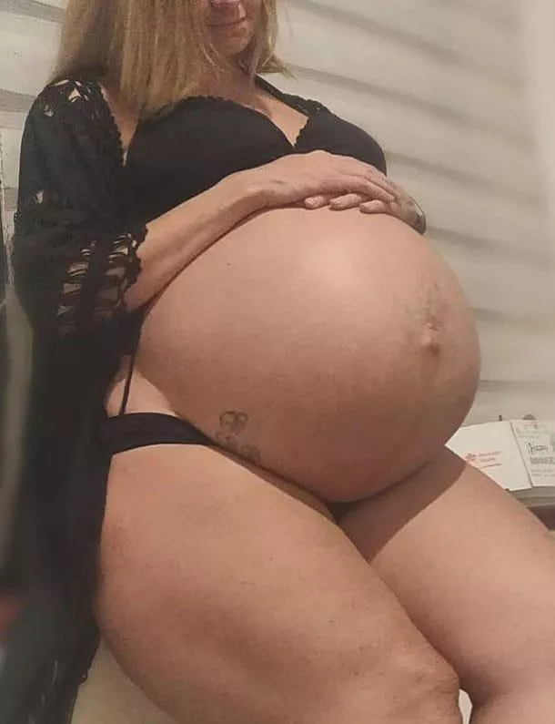 Huge round belly posted by longjohn410