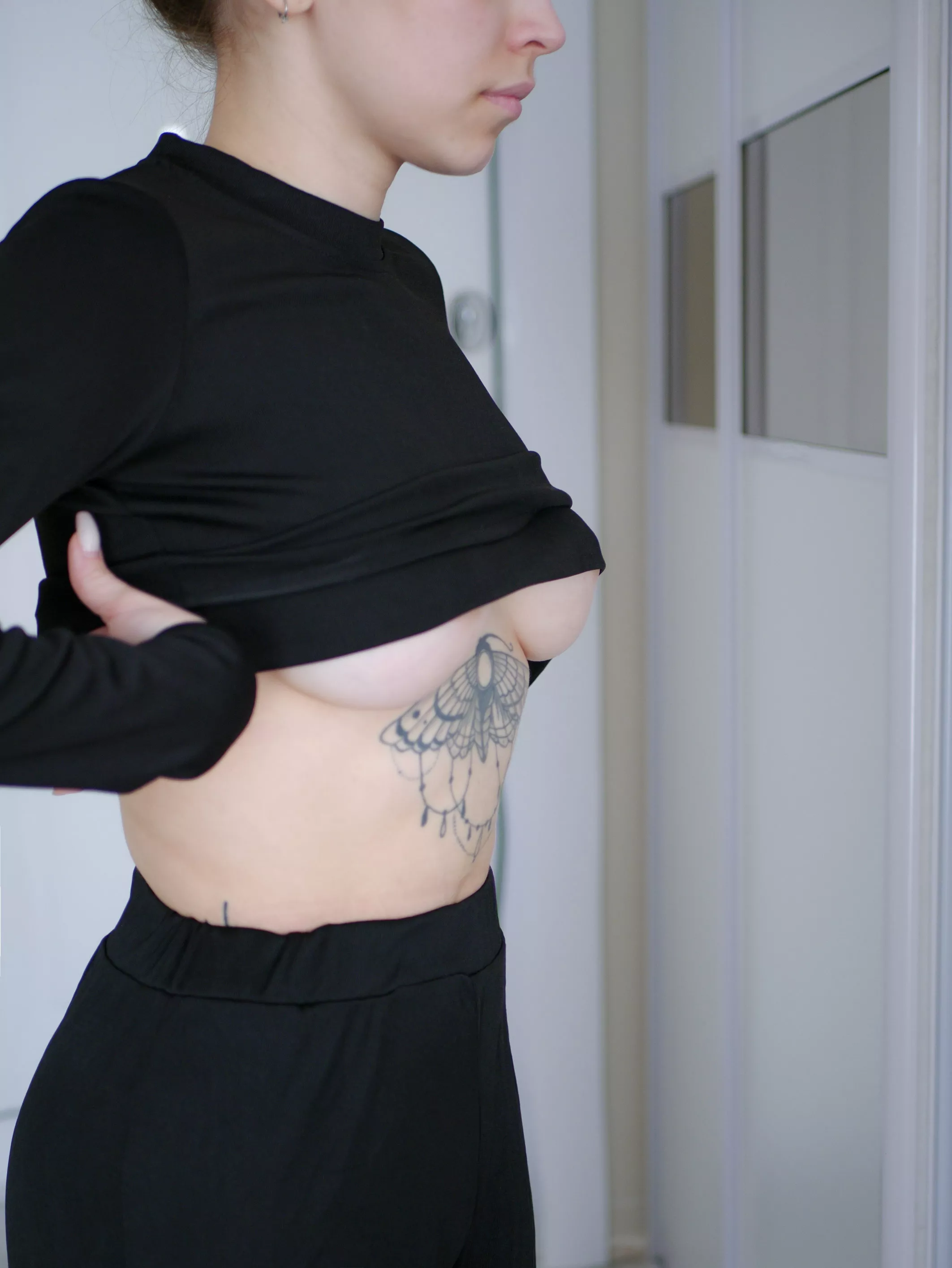 in black top 🖤🖤 posted by littlehornybae