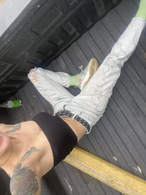 In the back of a pick up with a little piece of cloth hanging for dear life 😛😅😅 by kentessalovesyou