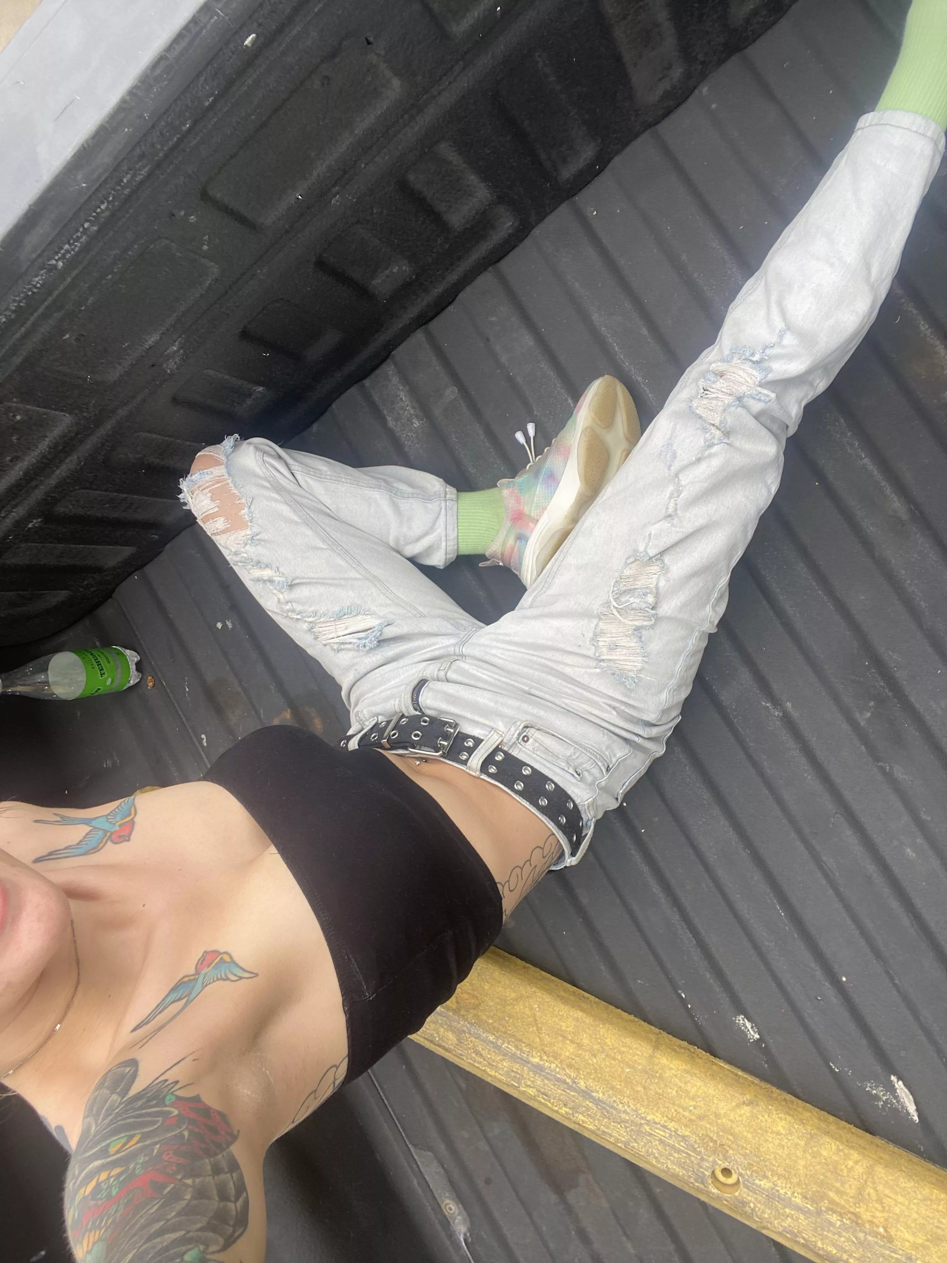 In the back of a pick up with a little piece of cloth hanging for dear life 😛😅😅 posted by kentessalovesyou