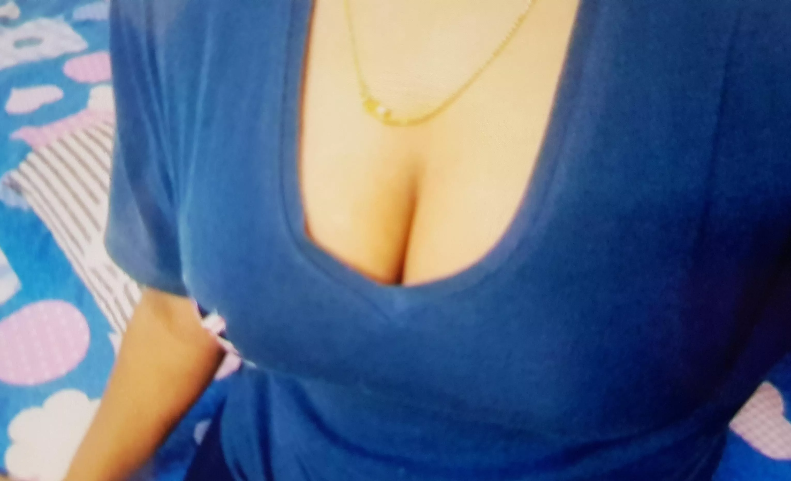 Is this deep cleavage enough to seduce my cousin? (f) posted by ritabra42