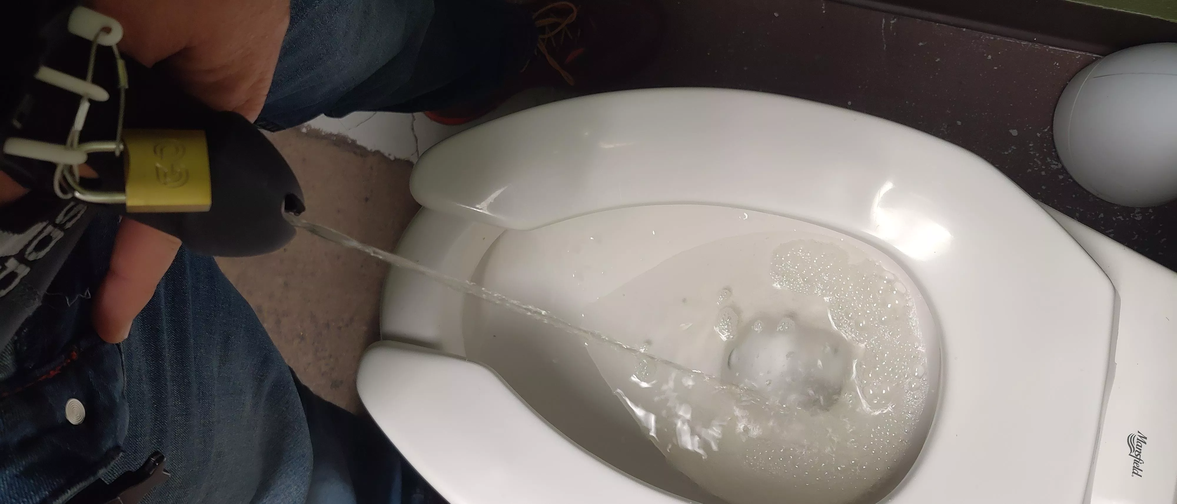 Is this welcome here? If so, first time peeing while locked up. posted by L_ABoundanddown