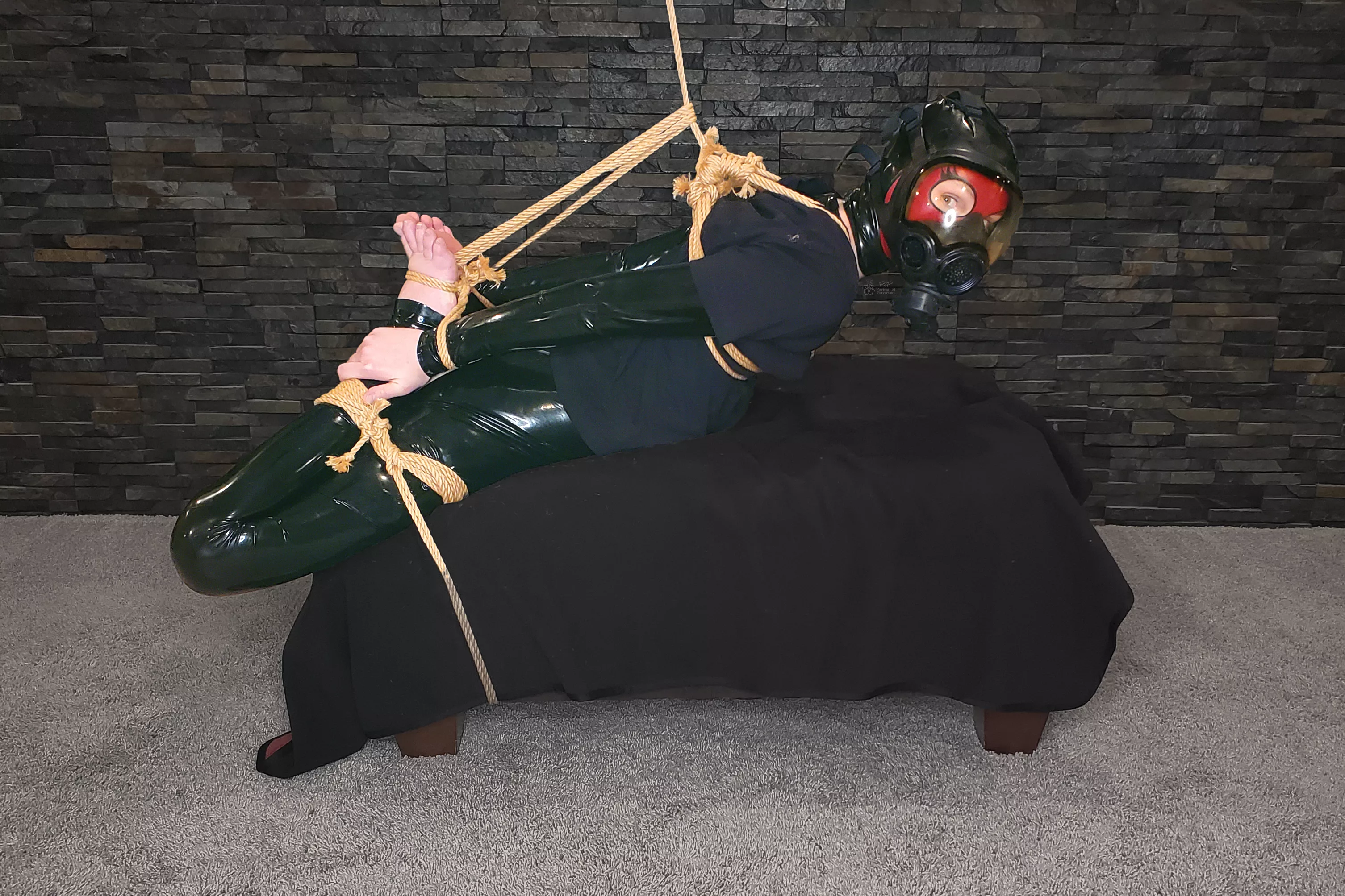 Just hanging out hog tied in rope and latex [OC] posted by PortraitOfPerversion