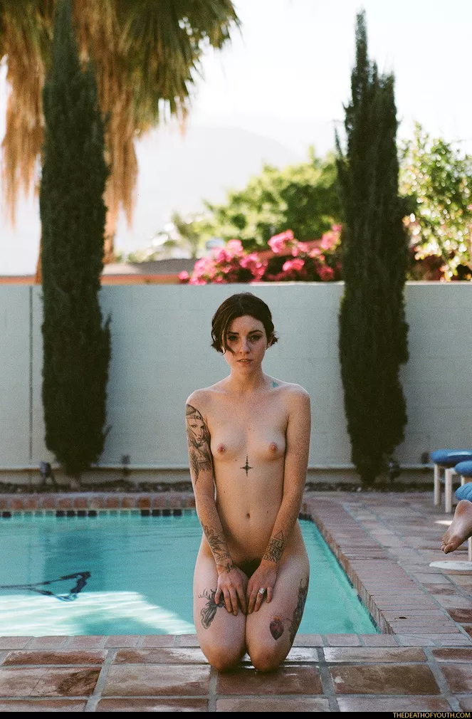 Kneeling by the pool posted by Rafflemo