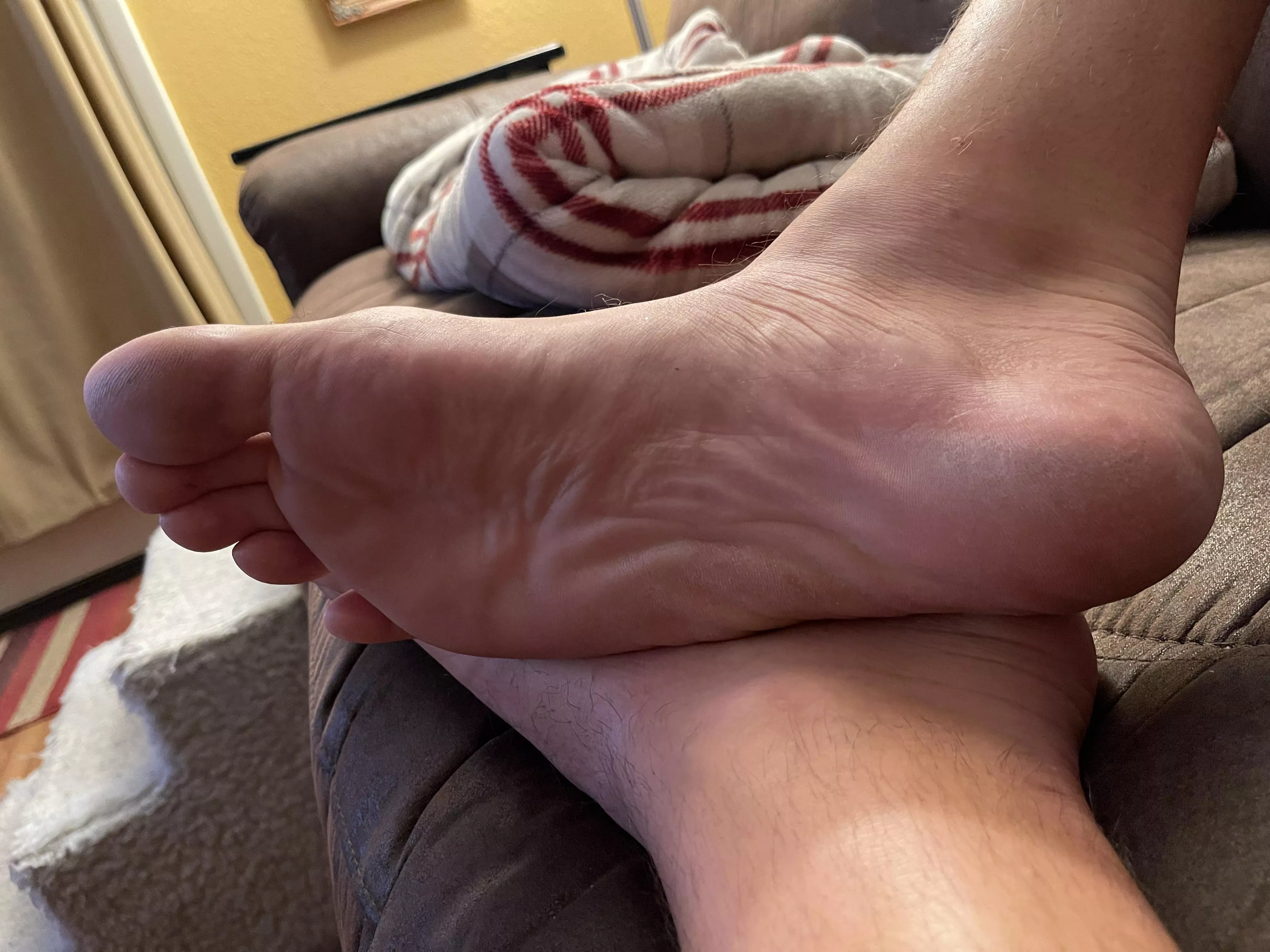 Letting these big feet free after a long days work. posted by FootLongSole