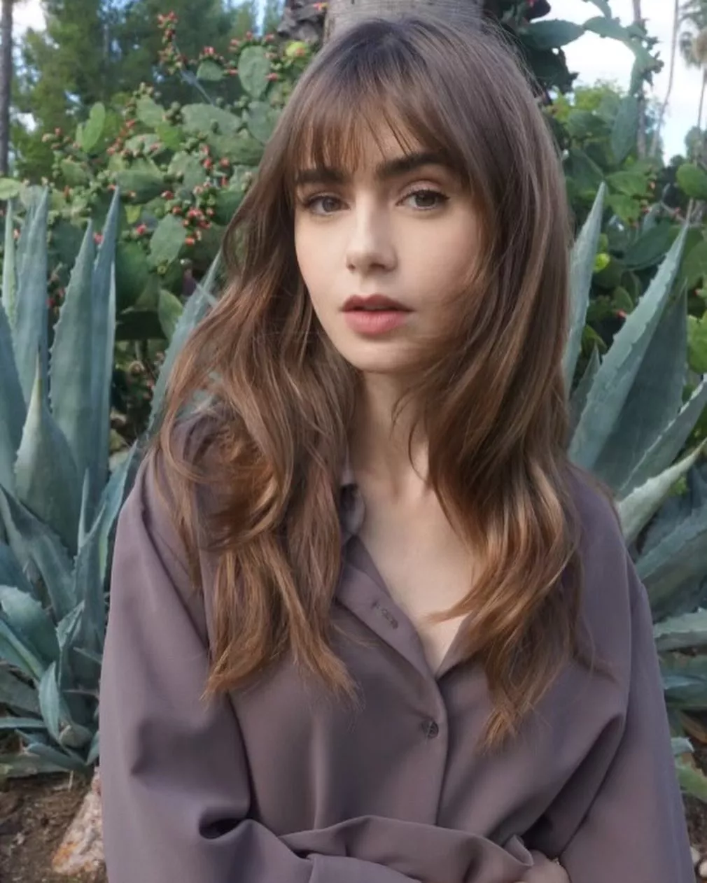 Lily Collins posted by IgniXAxii