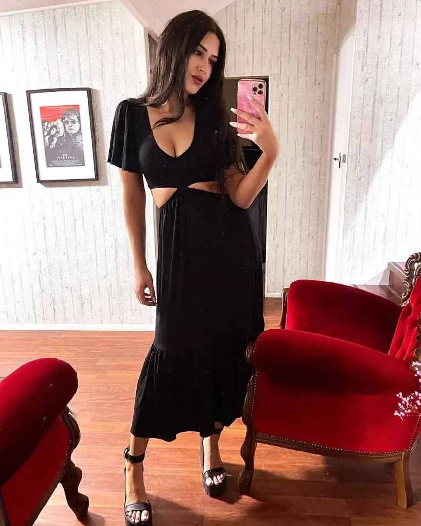 Long black dress... but make it sexier. by 95185