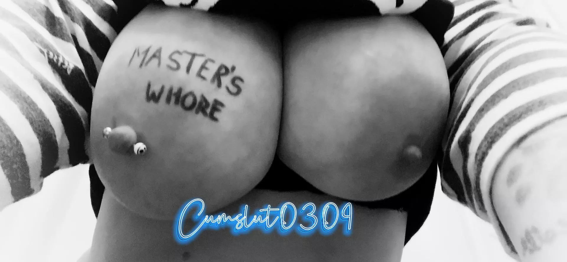 Master’s tits proudly tagged and displayed 💙🖤 posted by cumslut0309