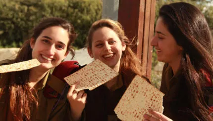Matzah-eating IDF women. Happy Pesach! posted by guitartoad