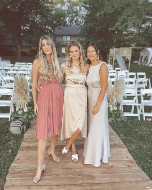 mom or one of the daughters? by richard_smoker_