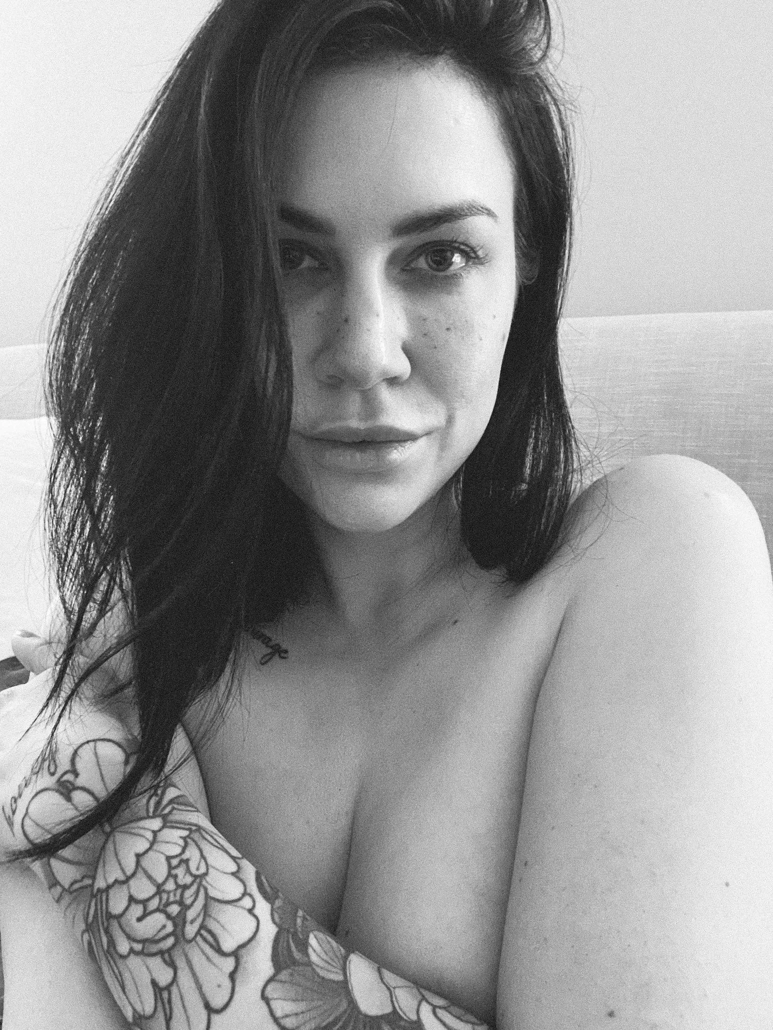Morning selfie from bed. Makeup free and messy hair🖤 posted by painted_goddess