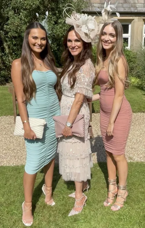 Mother and two daughters by round_plastic