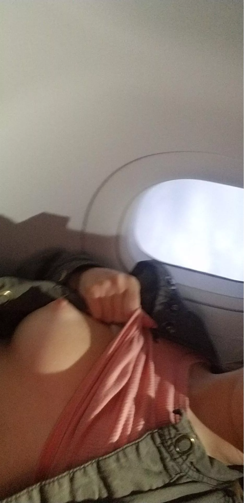 My heart was racing while I was flashing a titty on this very crowded flight! posted by lexxiskybabe