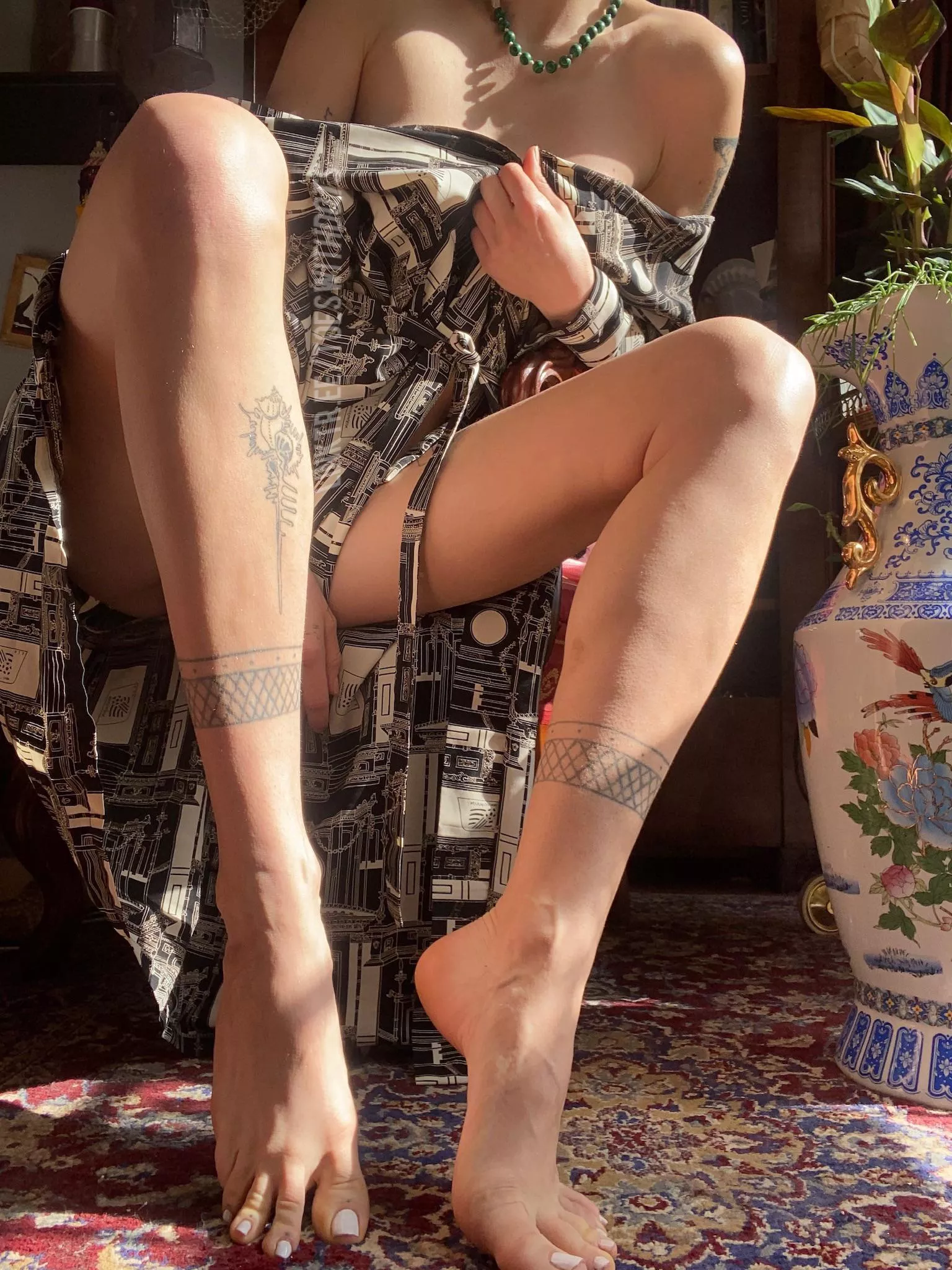 My long tattooed legs in the sun posted by toeswithdots