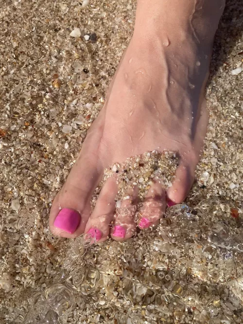 My wife’s pretty feet in Mexico. by sober_ben