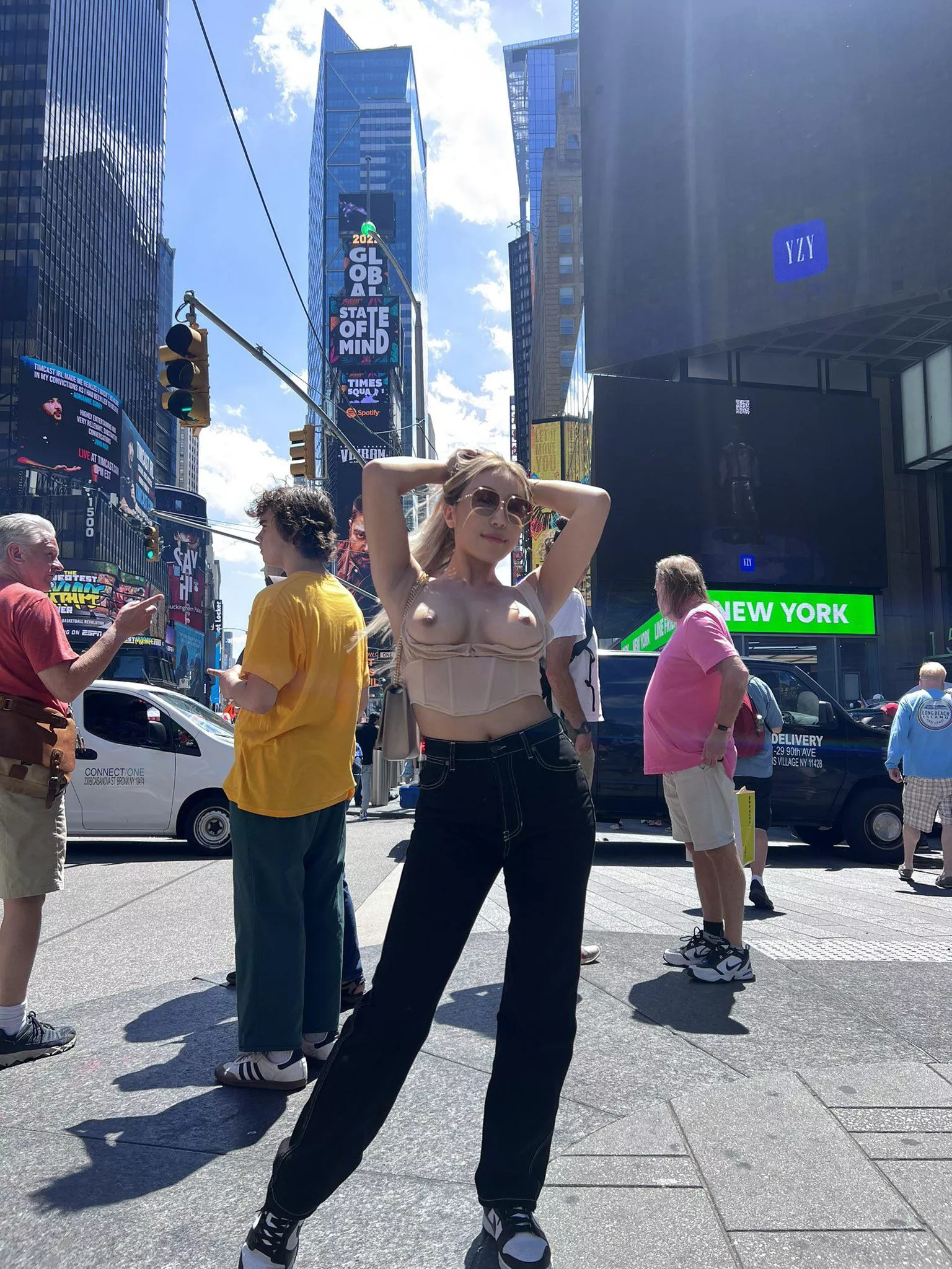 Nicole Doshi blessing Times Square in NYC posted by nicoledoshi