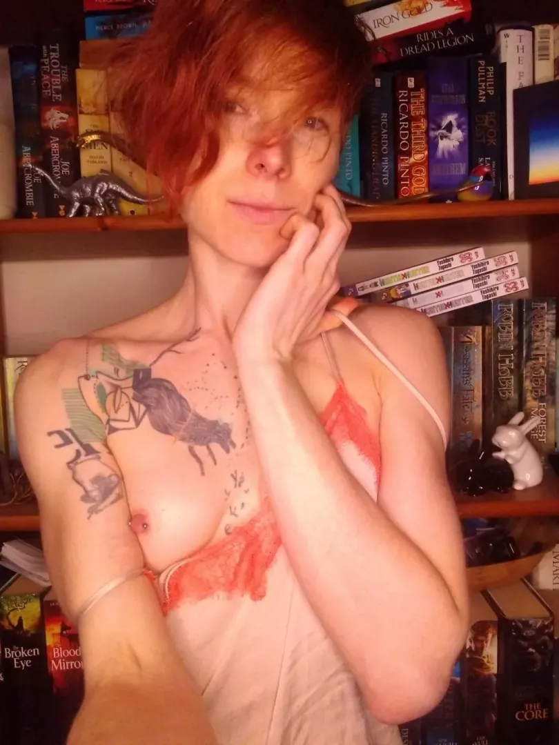 Oops! Nipply bookcase selfie posted by JuniperLunaRocks