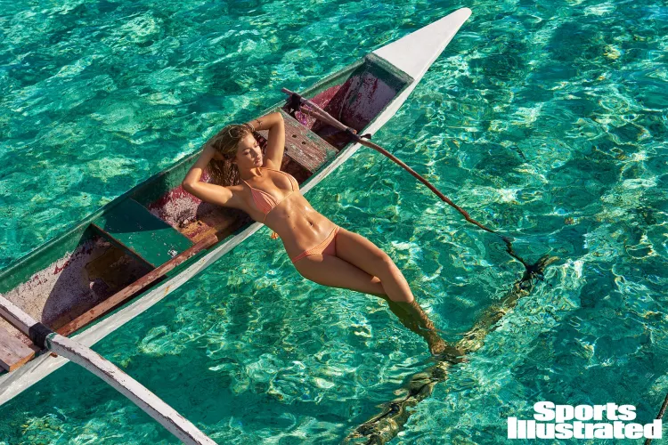 Outrigger canoe by bikinireef