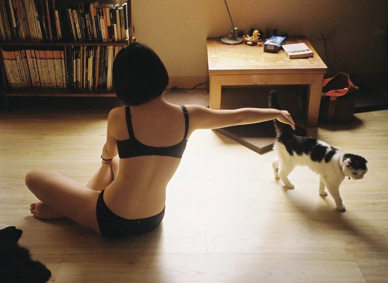 Petting her kitty posted by bubblrisback