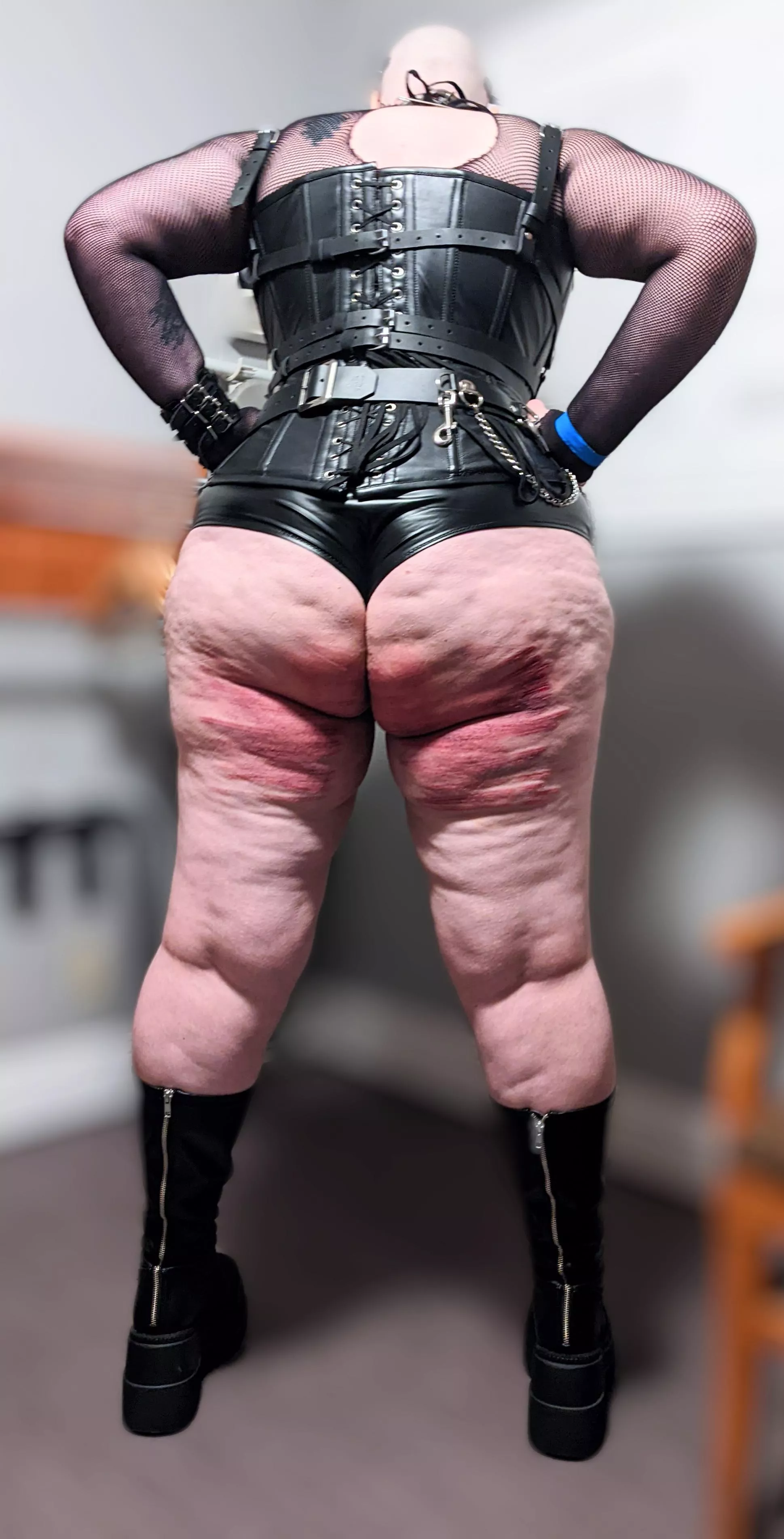 Red bottom, boots and corset posted by _Londoncalling