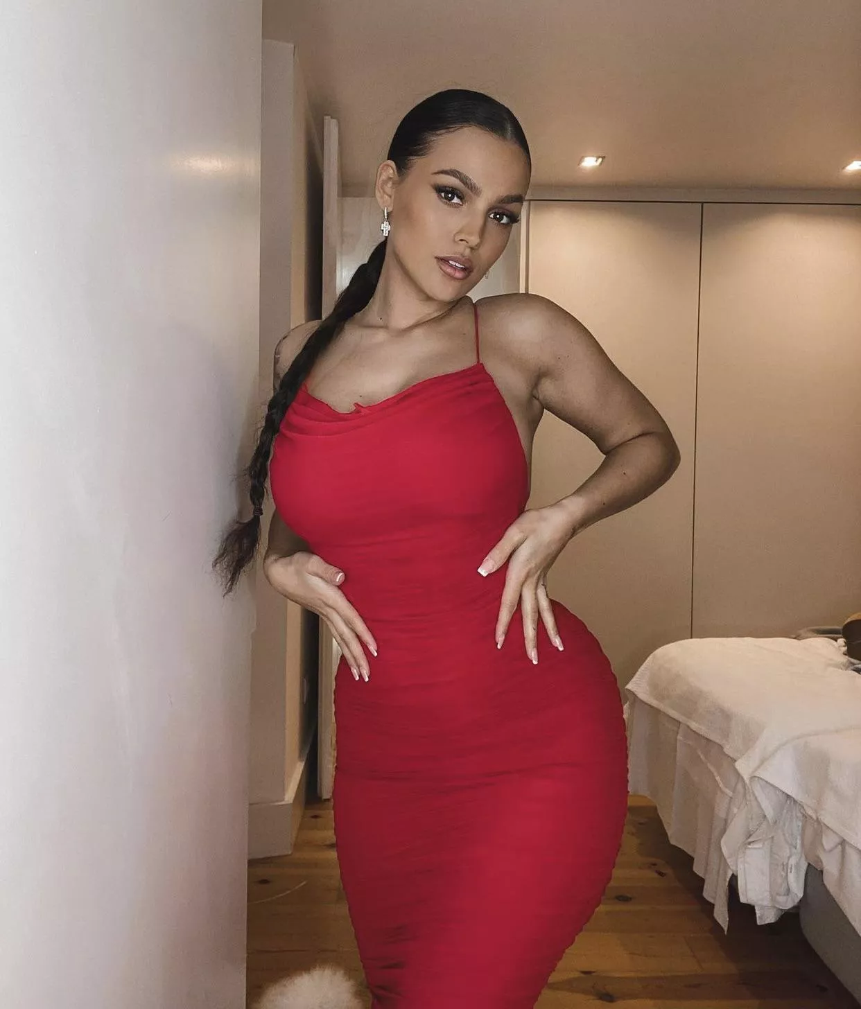 Red dress defines her curves posted by ResponsiveCock