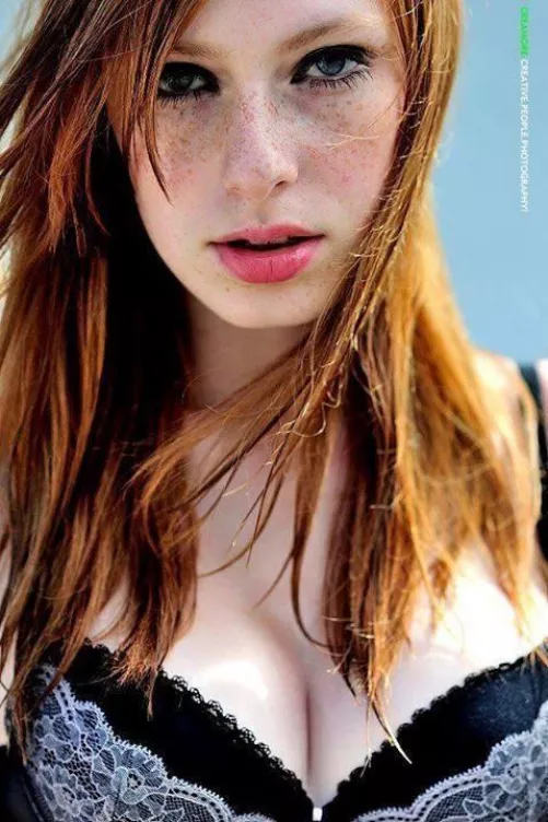 Red hair: check. Freckles: check. Cleavage: bonus! by Kreigstern