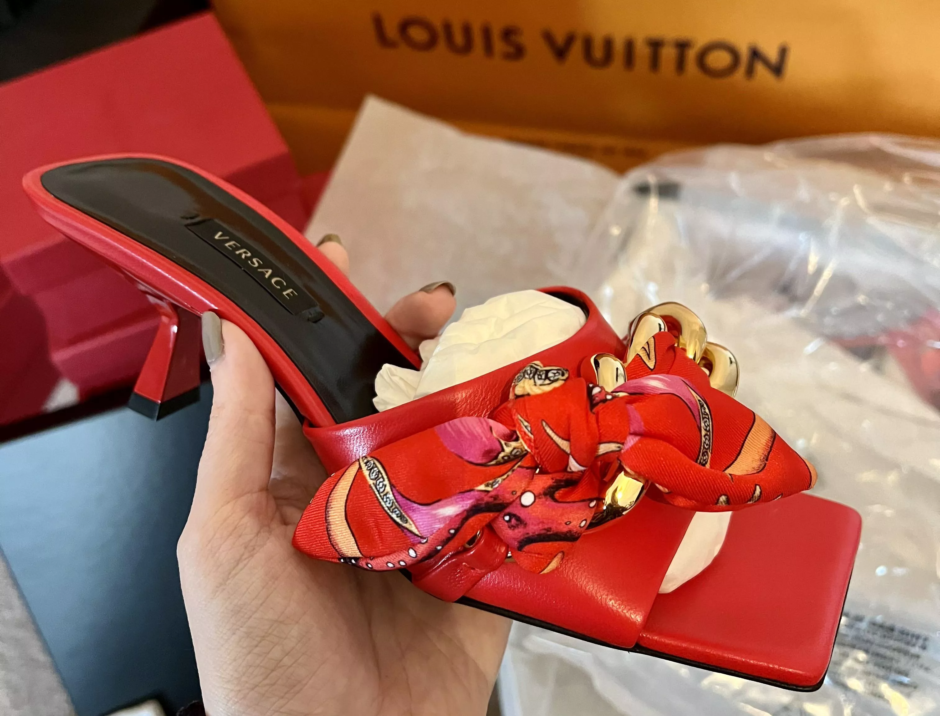 Shooting content in these beautiful Versace sandals. Natural nails or red toe polish? posted by MadammeJessica