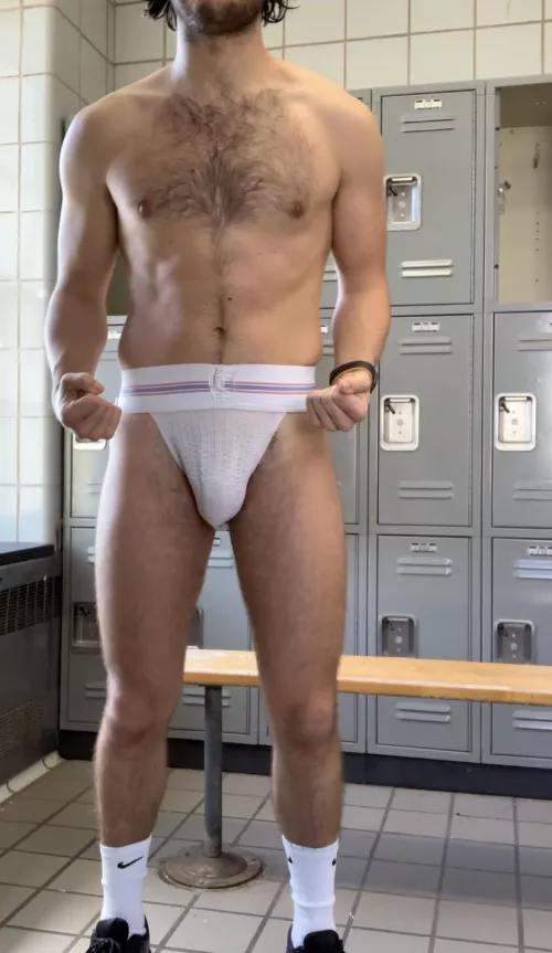Showing off my jock in the locker room by longhornboy15